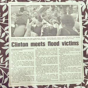 Chicago Sun Times Clinton Meets Flood Victims